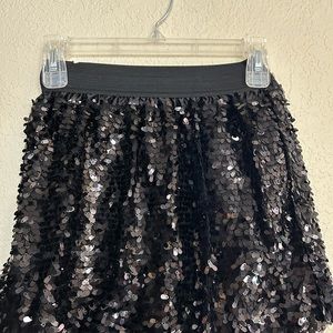 Girl’s black sequin skirt